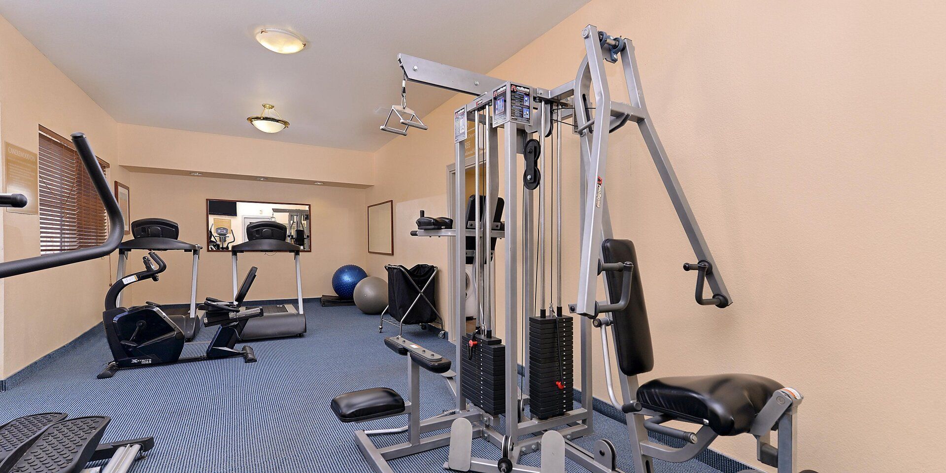 fitness area room with workout equipment