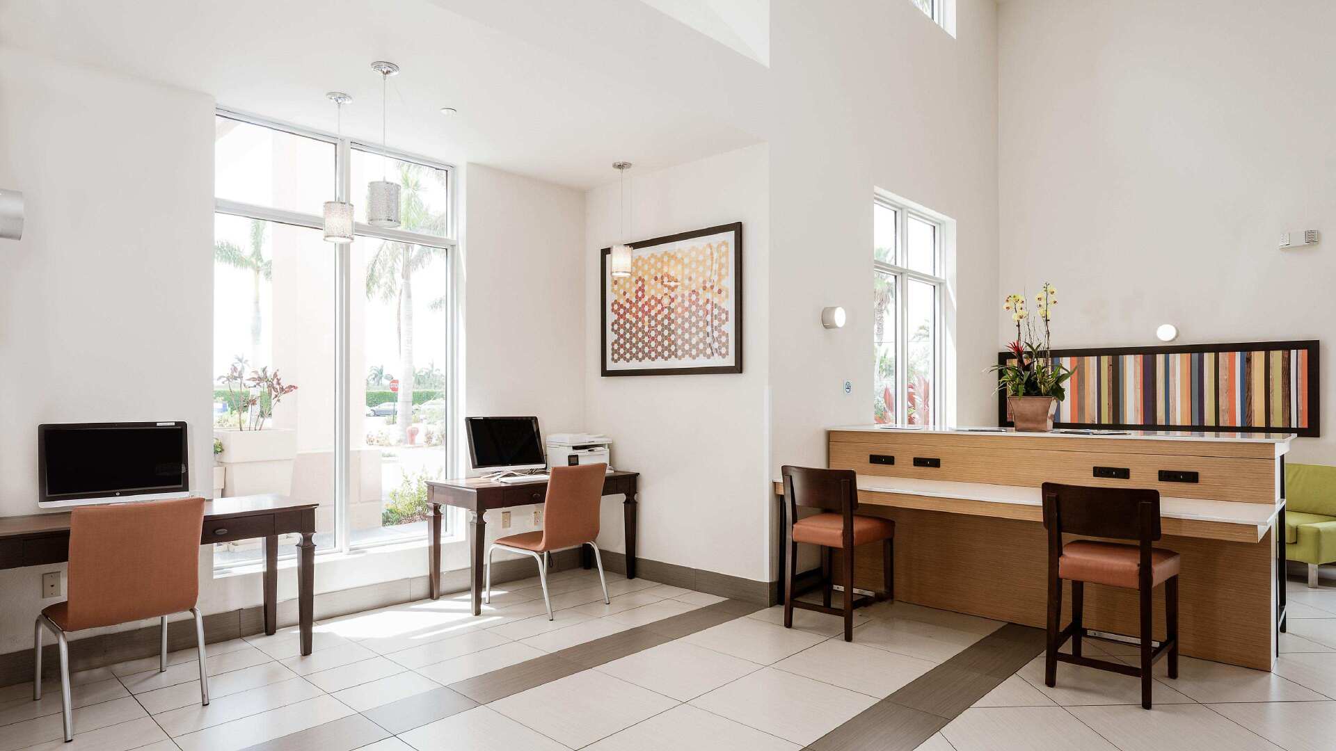 view of the hotels main lobby with work stations