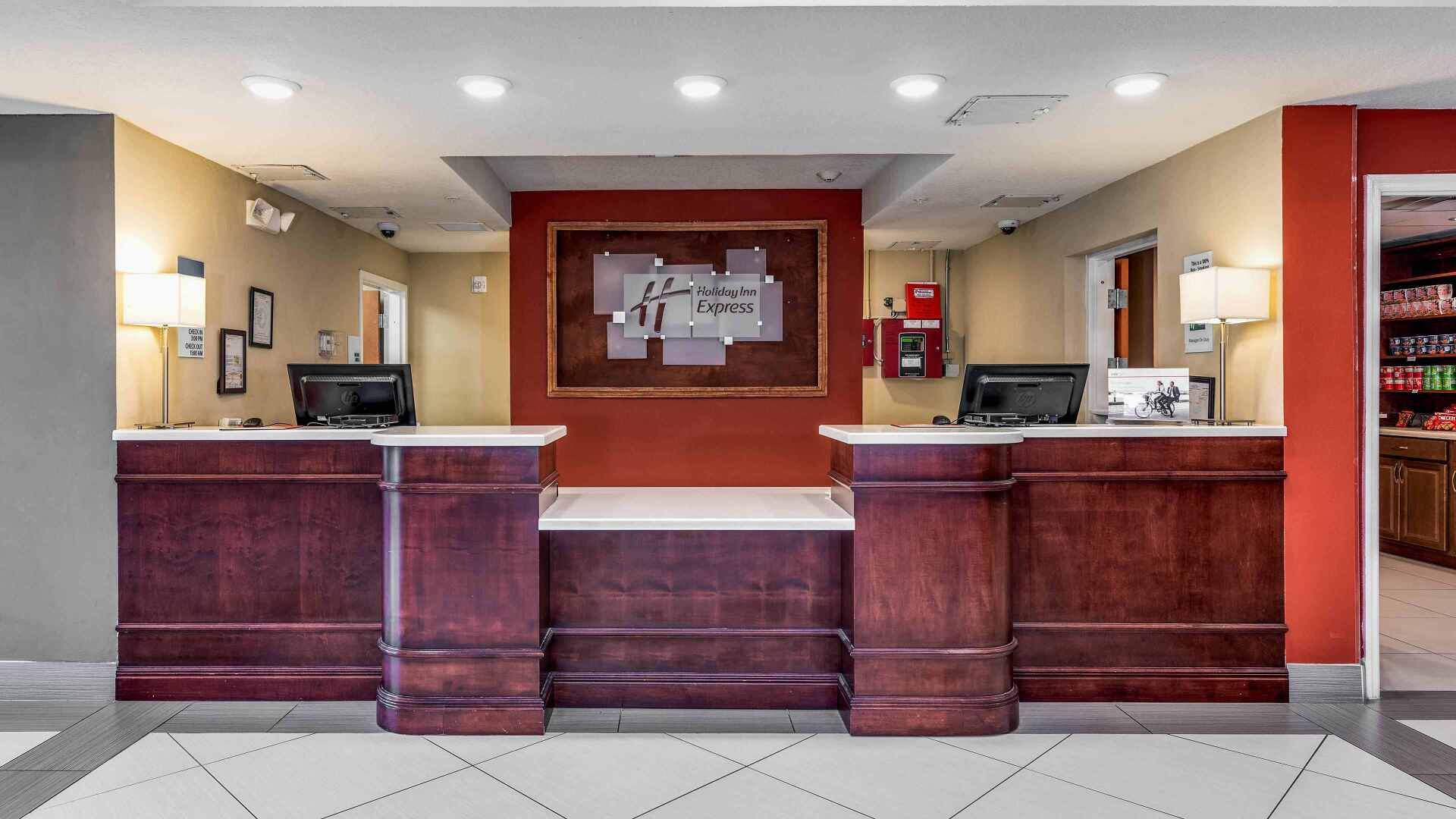 view of the hotel check in area with brown countertops