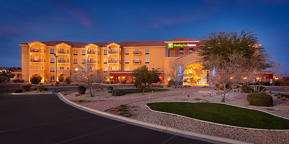 front view of the hotel with a blue sky