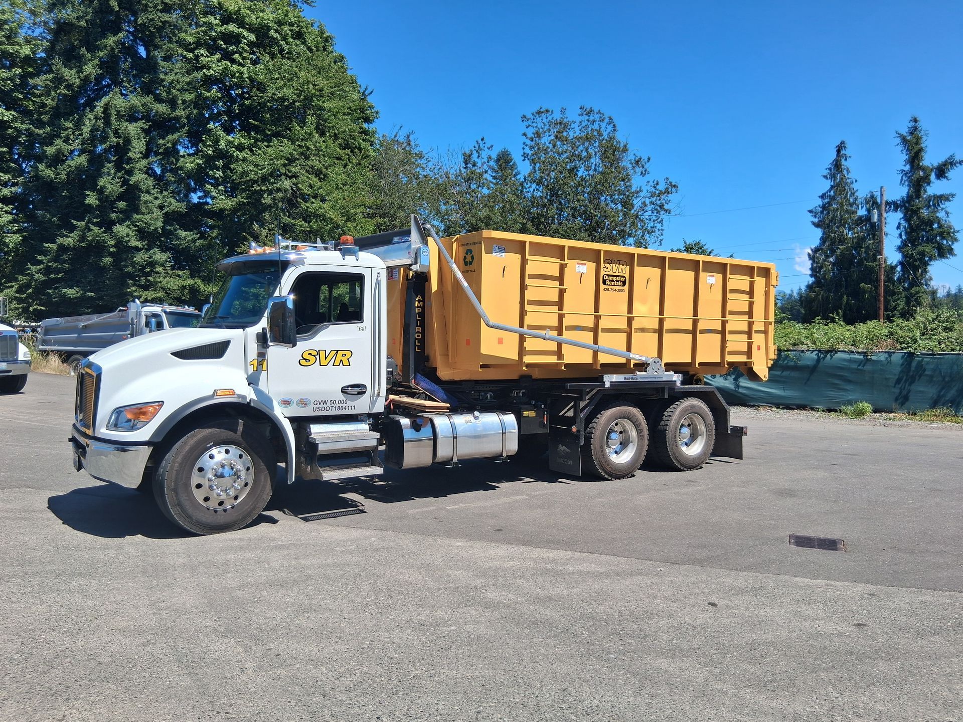 Roll-Off Dumpster — Lake Stevens, WA — Snohomish Valley Roofing Roll-Off Dumpster — Lake Stevens, WA — Snohomish Valley Roofing