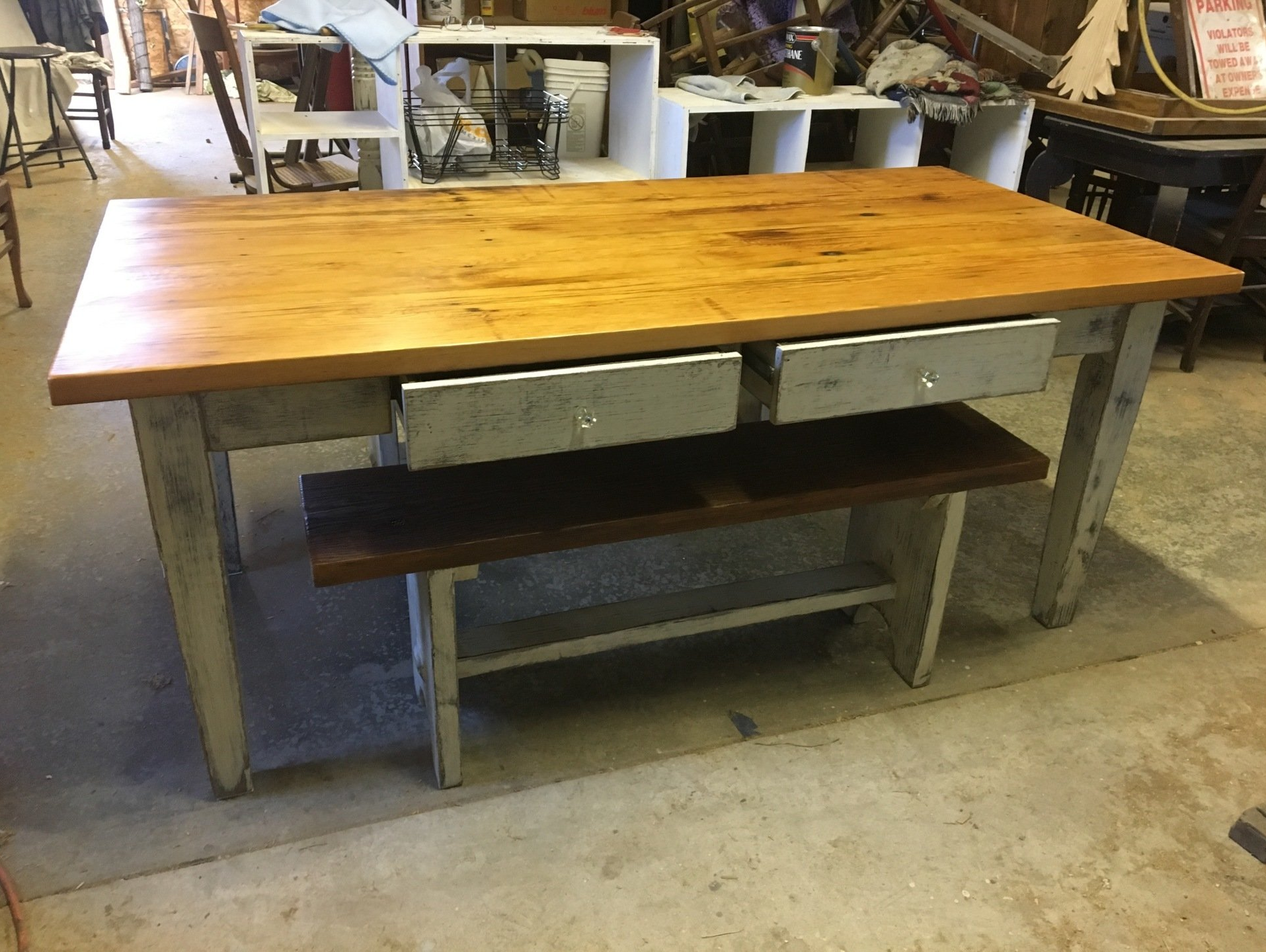 Bleacher wood table and benches in workshop.