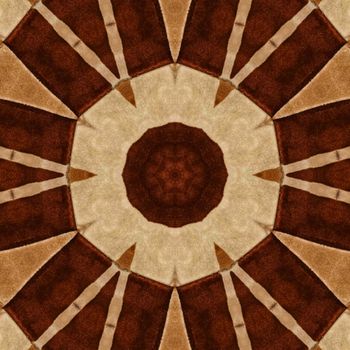 Kaleidoscopic pattern of brown and beige brickwork, forming an octagonal design with a central floral-like shape.