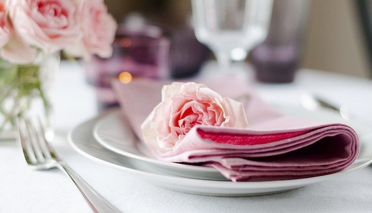Plate with Napkin and Rose on it — Mildura, VIC — Lay’s Mobile Chef Catering Service