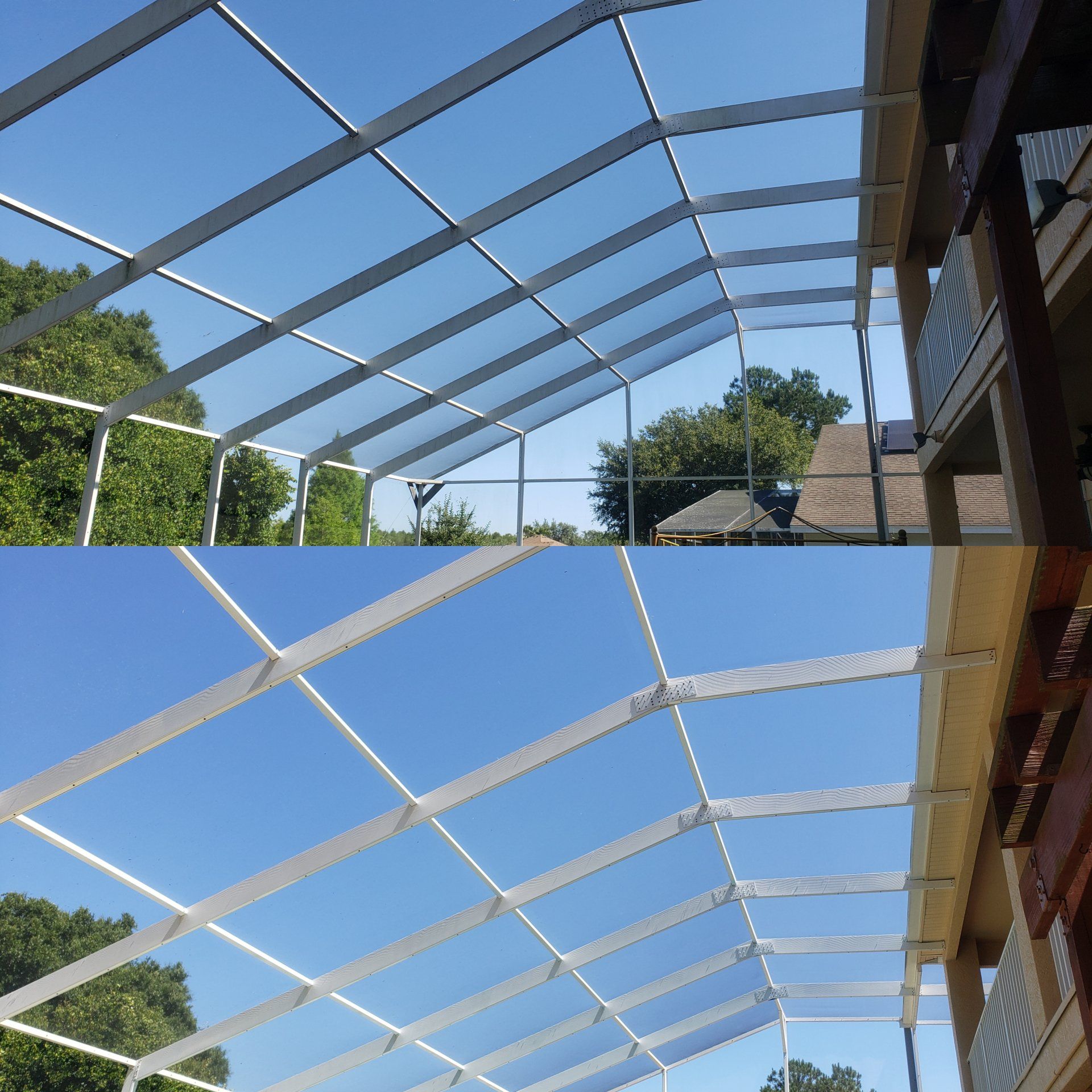 Screened-in porch roof with a clear blue sky above and surrounding trees.