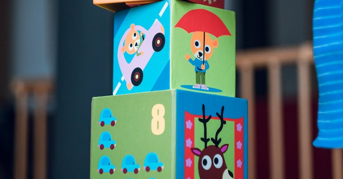 A stack of colorful blocks with animals and numbers on them.