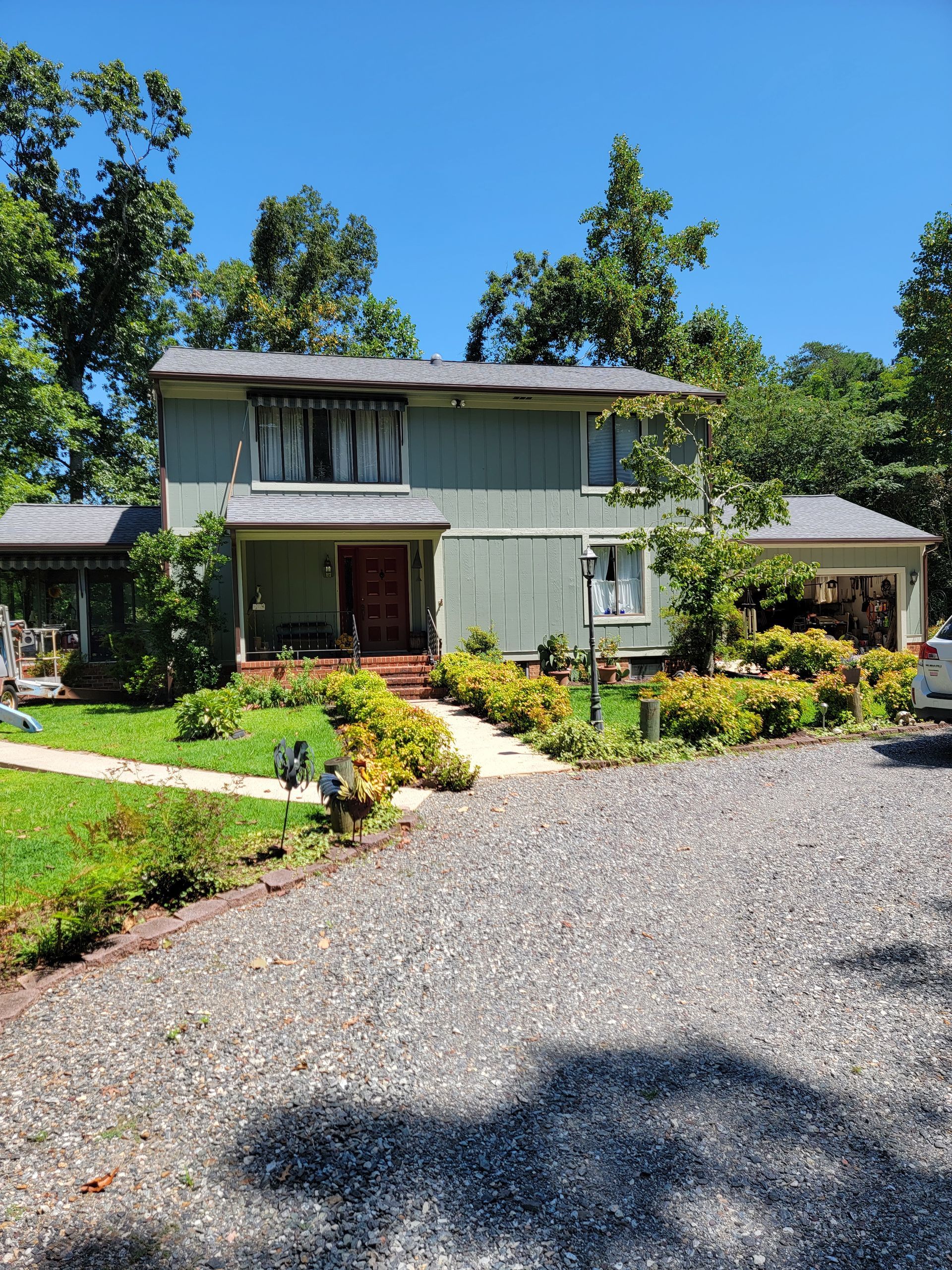 House with Green Lawn — Kilmarnock, VA — My Handyman