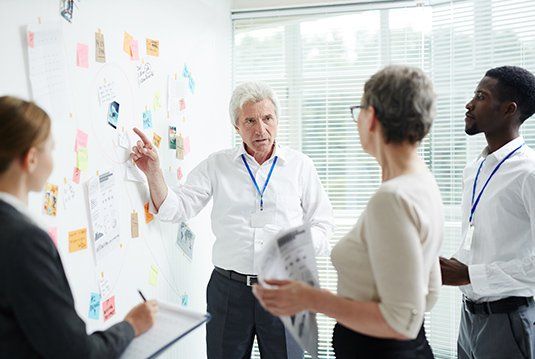 Monitoring Security — Man In Control Room Monitoring CCTV Footage in Grapevine, TX Monitoring Security — Man In Control Room Monitoring CCTV Footage in Grapevine, TX