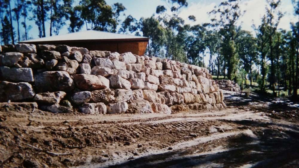 Huge Rocks Used for Retaining Walls — Wallaroo Landscapes In Nowra, NSW