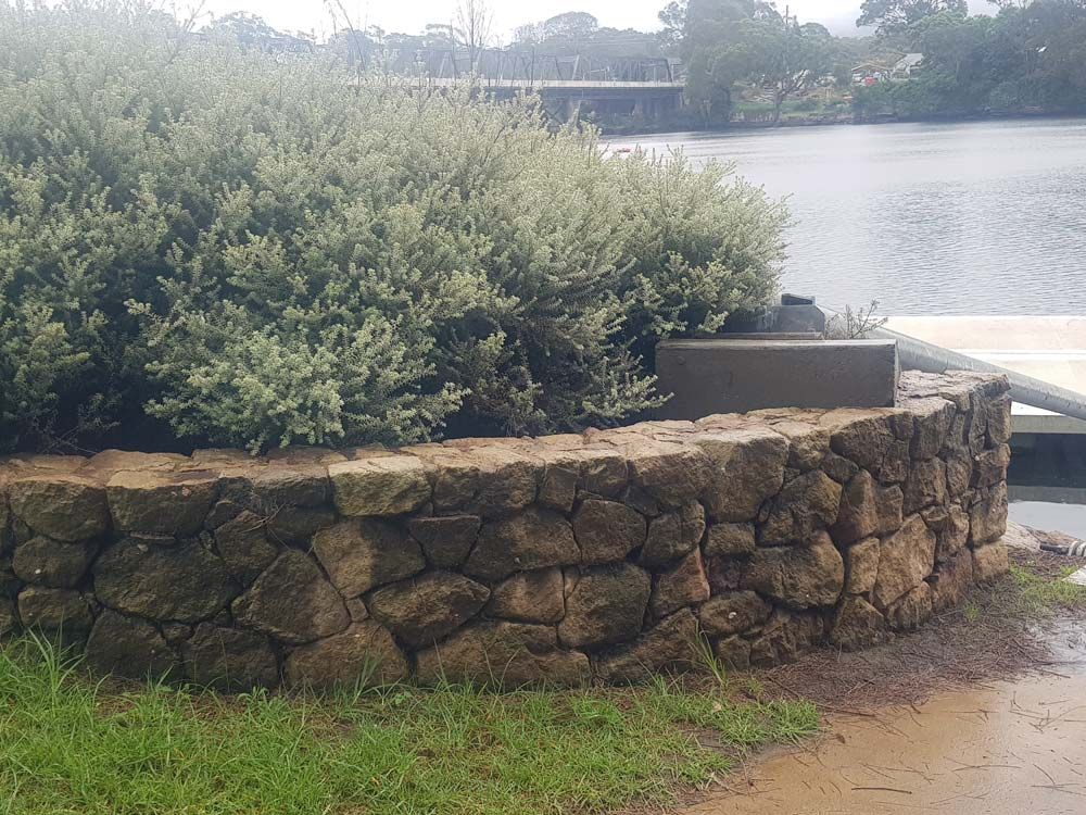 Rock Wall Beside the River — Wallaroo Landscapes In Nowra, NSW