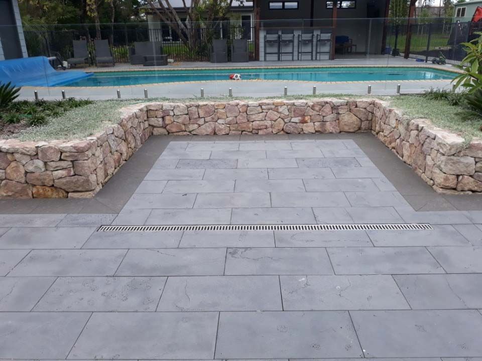 Stone Retaining Wall Pool Side — Wallaroo Landscapes In Nowra, NSW