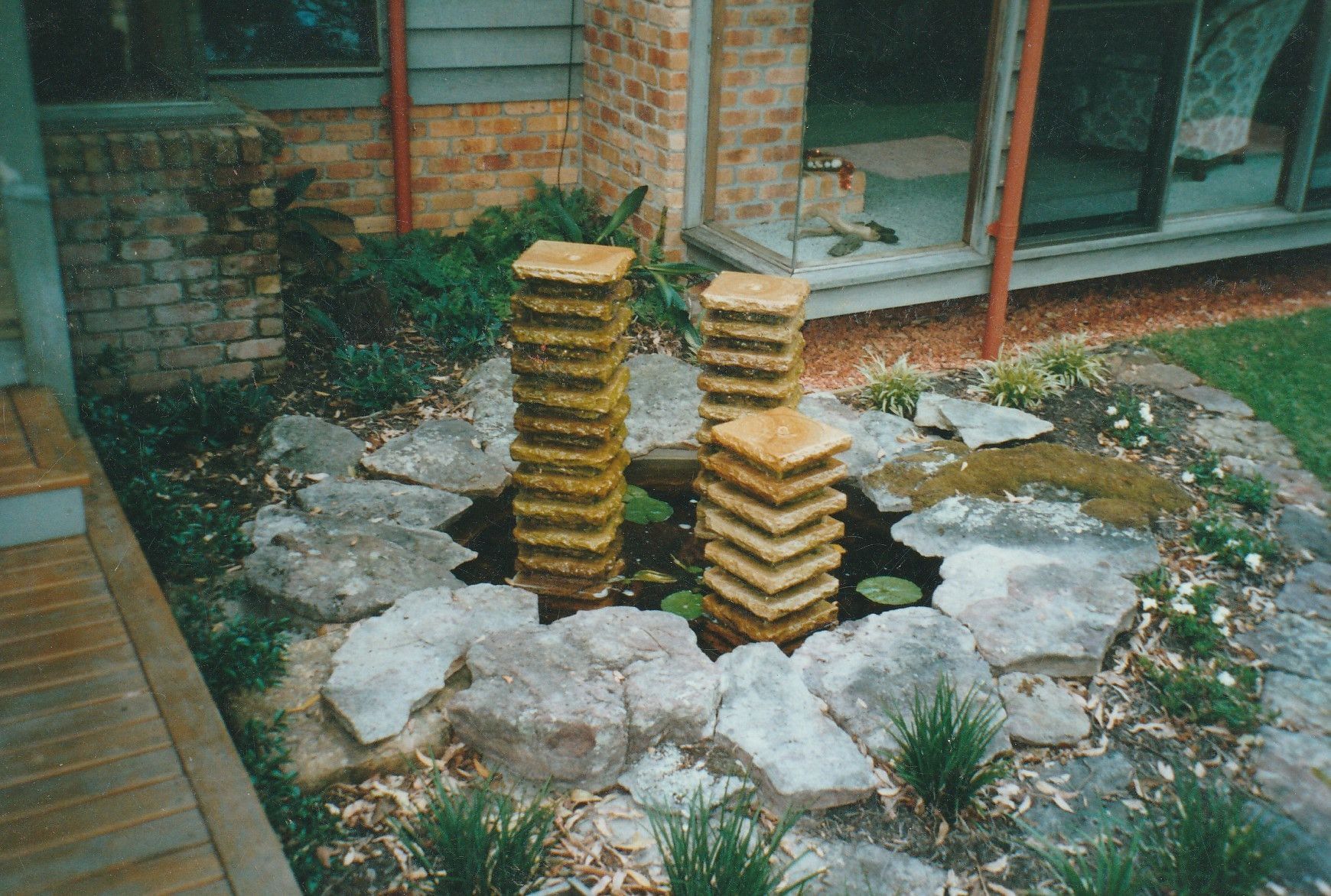 Beautiful Landscaping Garden In Residential House Backyard — Wallaroo Landscapes In Nowra NSW