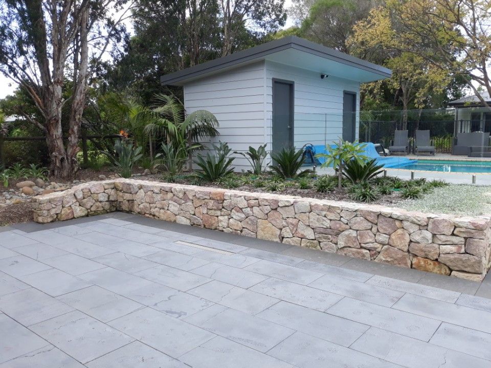 Some Flowers And Nicely Trimmed Bushes On The Front Yard — Wallaroo Landscapes In Nowra NSW