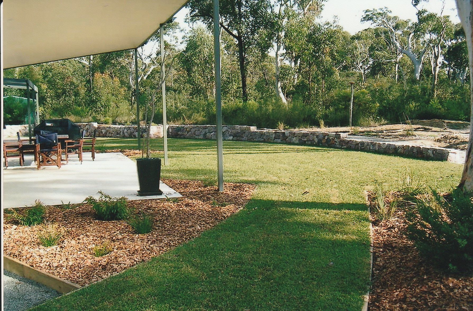 Landscape Gardener Laying Turf For New Lawn — Wallaroo Landscapes In Nowra NSW