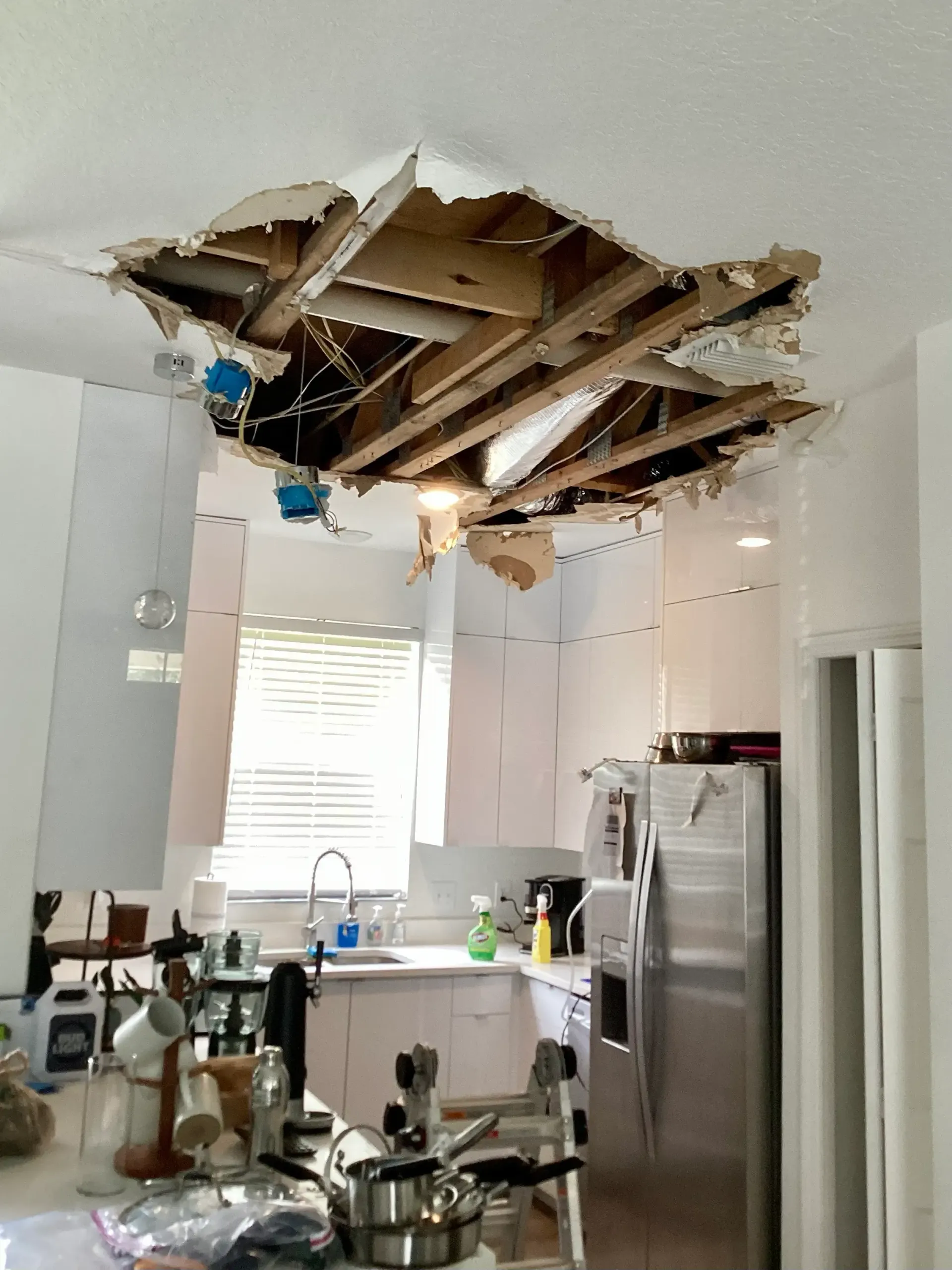 Ceiling caved in from. roof leak