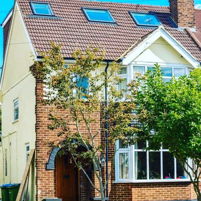 new building with trees infront