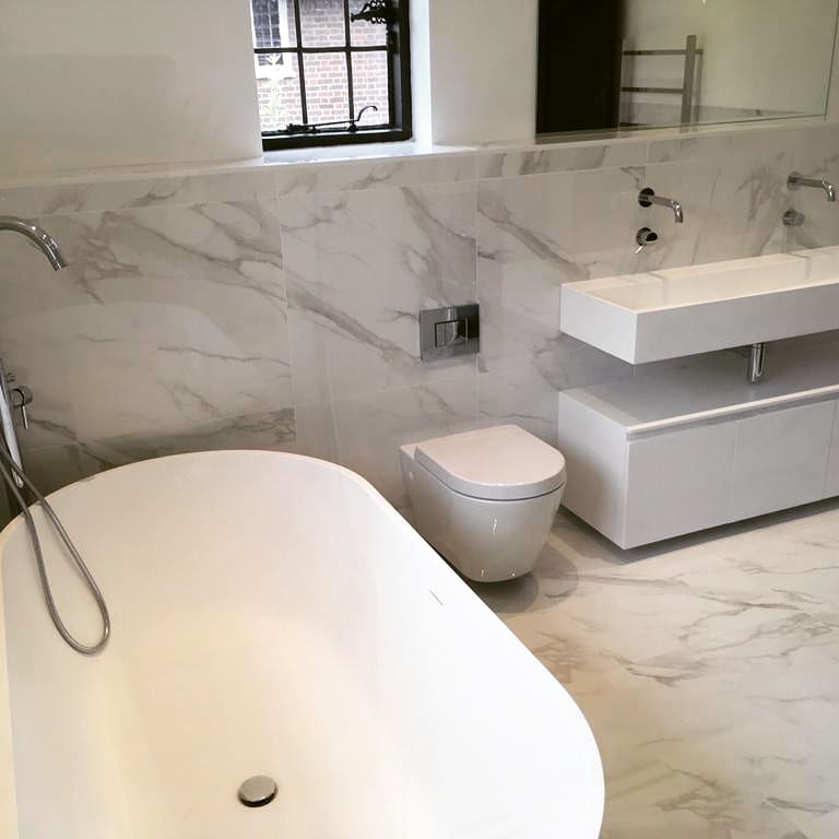 bathroom with sink and bath tub