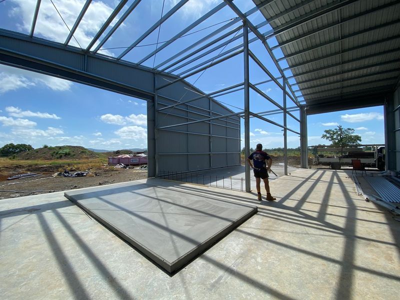 A large frame of a commercial building on a large piece of land — Wal's Concreting Service in Byron Bay, NSW