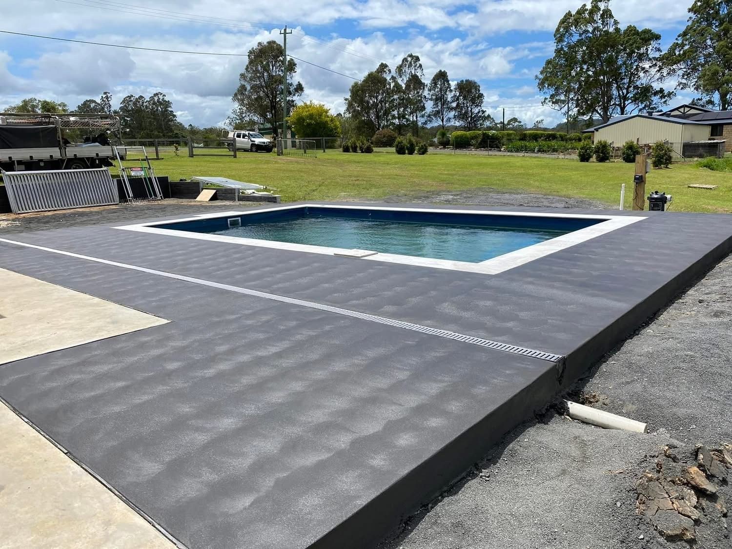 Concrete Pool Surrounded by concrete — Wal's Concreting Service in North Casino, NSW