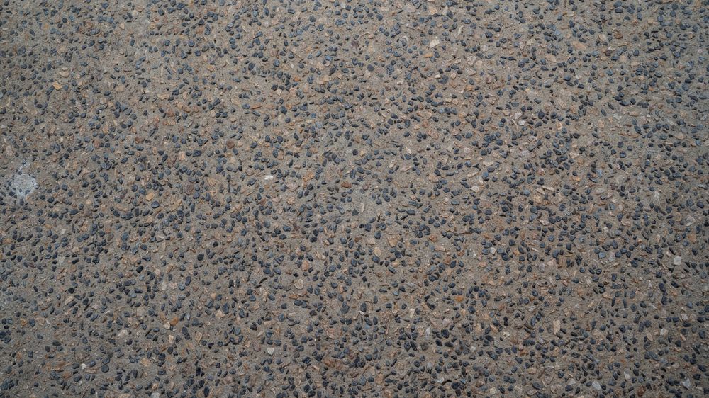Close-Up of Rough, Speckled Surface, Predominantly Grey with Small Black — Wal's Concreting Service in Lismore, NSW