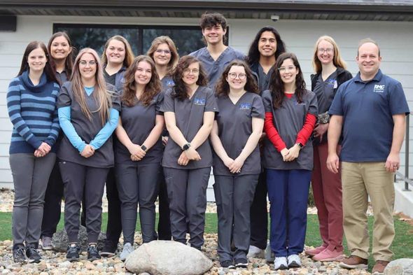 group photo of the doctors and staff of Pet Medical Center located in Ames, Iowa