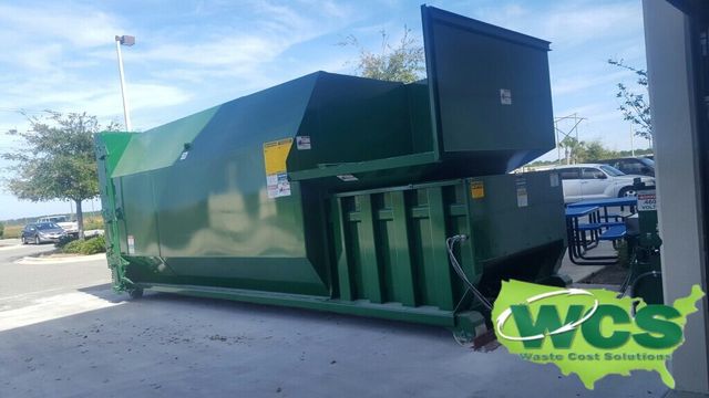 Trash Compactor Makes Room For More Garbage 