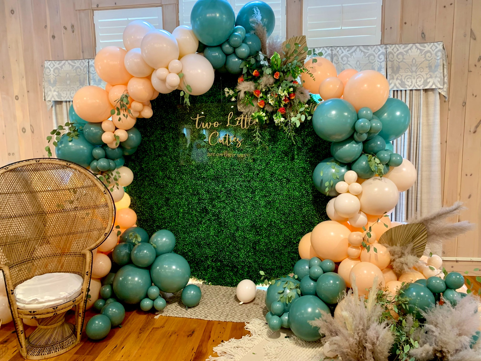 A room filled with balloons and a chair.