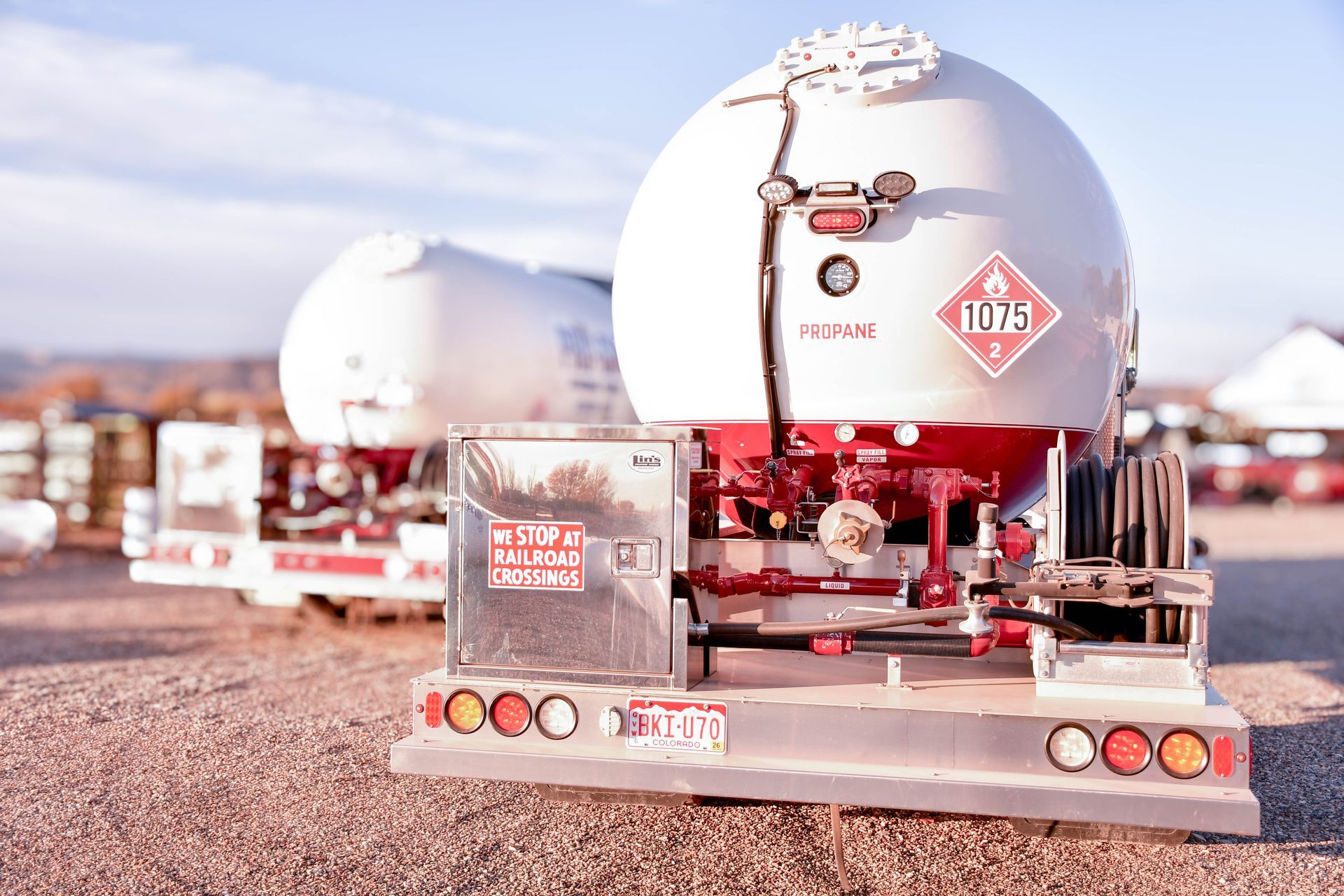 Large white propane tank with 