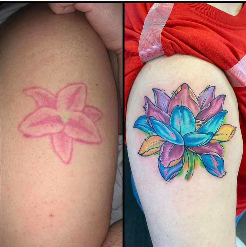 A woman has a tattoo of a flower on her arm