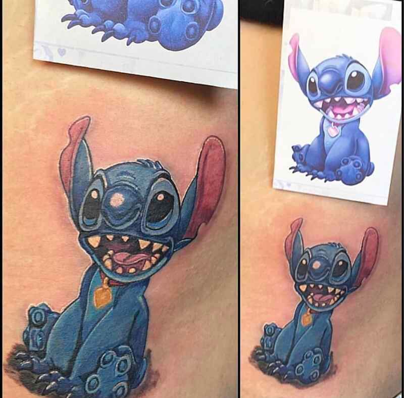 A tattoo of stitch is on a person 's arm