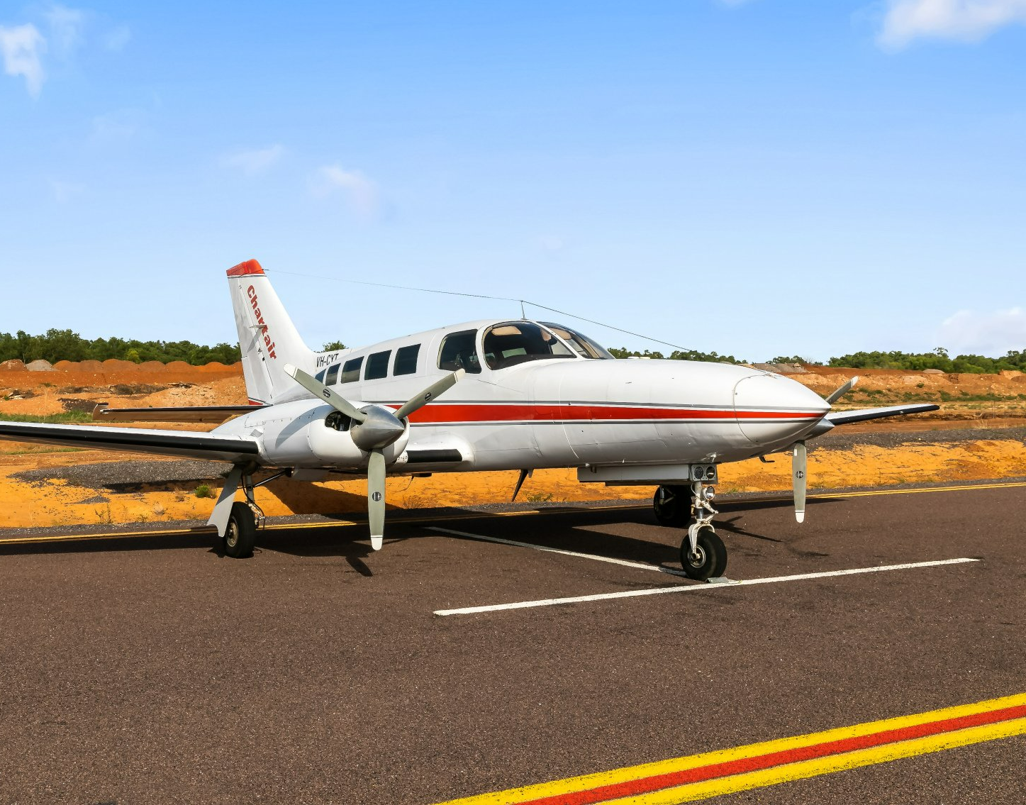 A cessna 402 parking on the ground