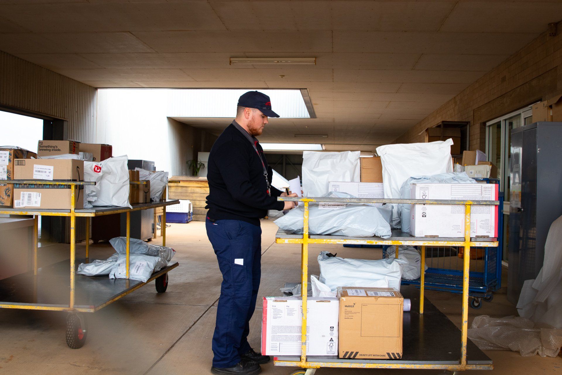 Chartair Staff is checking the freight to be loaded onto the aircraft