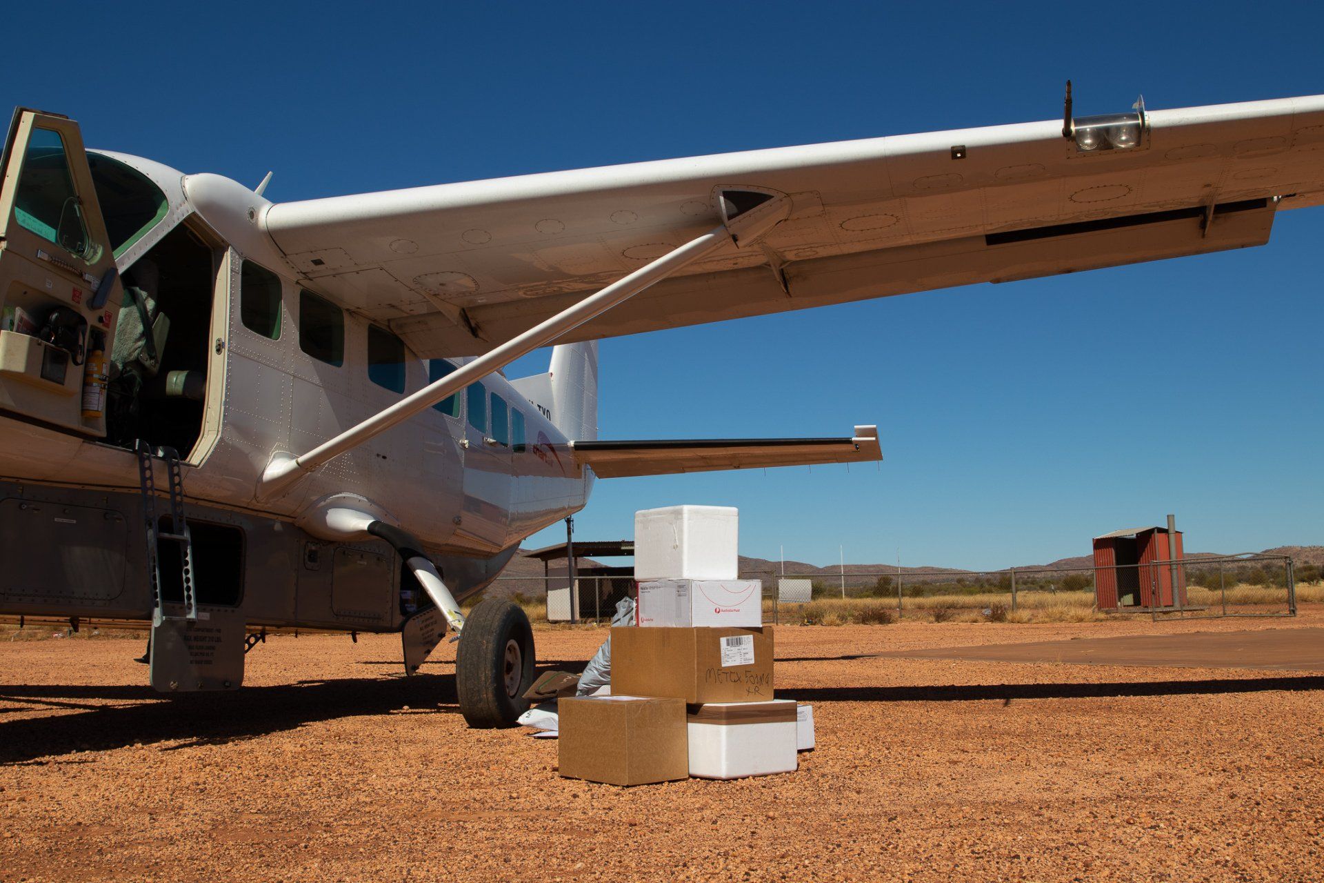 Chartair Mail Plane delivering parcels to Wingellina