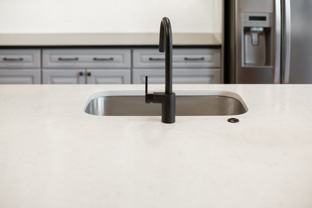 Lagoon Silestone Island Top, Waypoint Painted Stone Cabinets