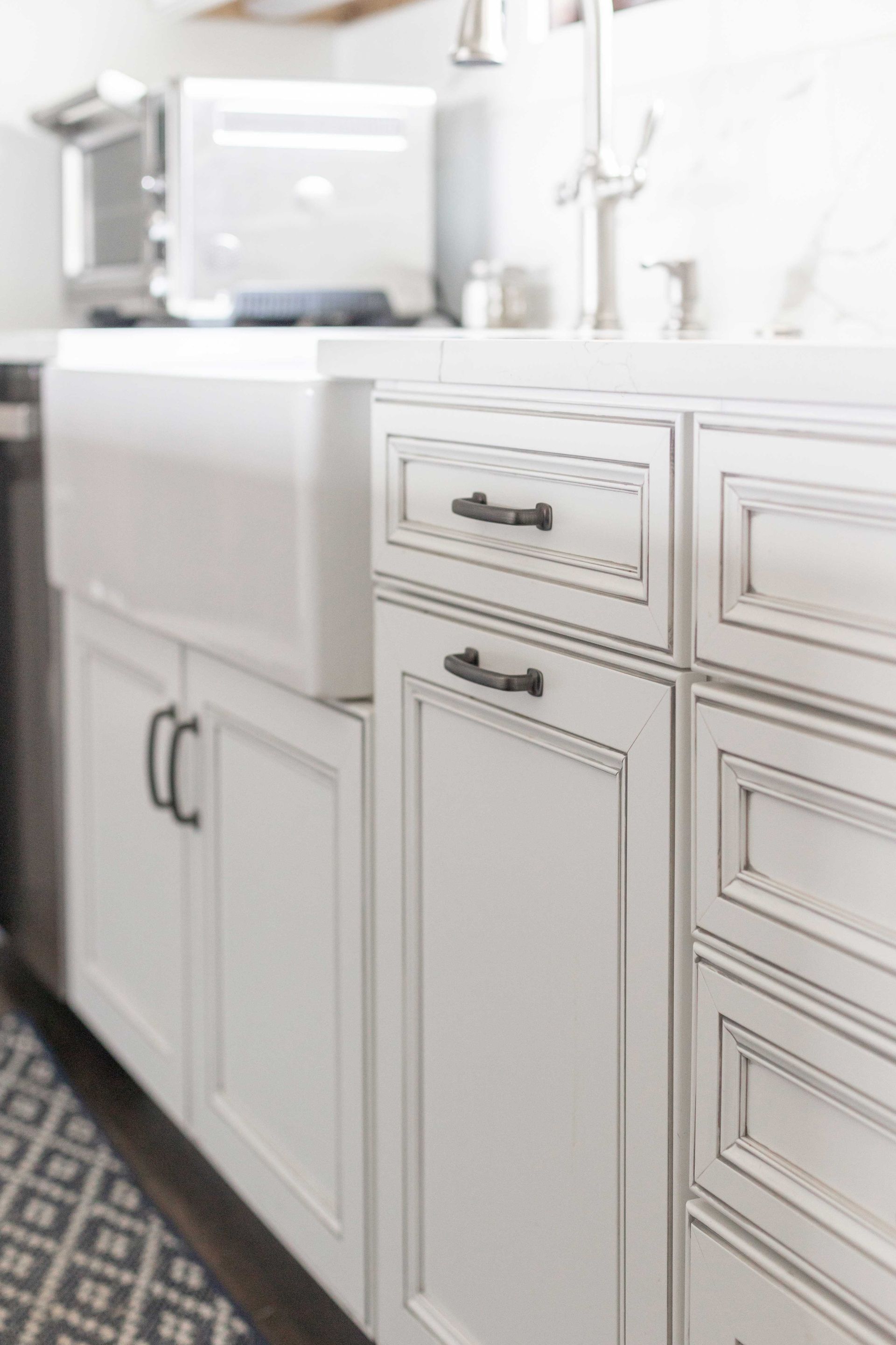 Waypoint Painted Pewter Cabinets and Calacatta Laza Q Quartz Countertop and Highback