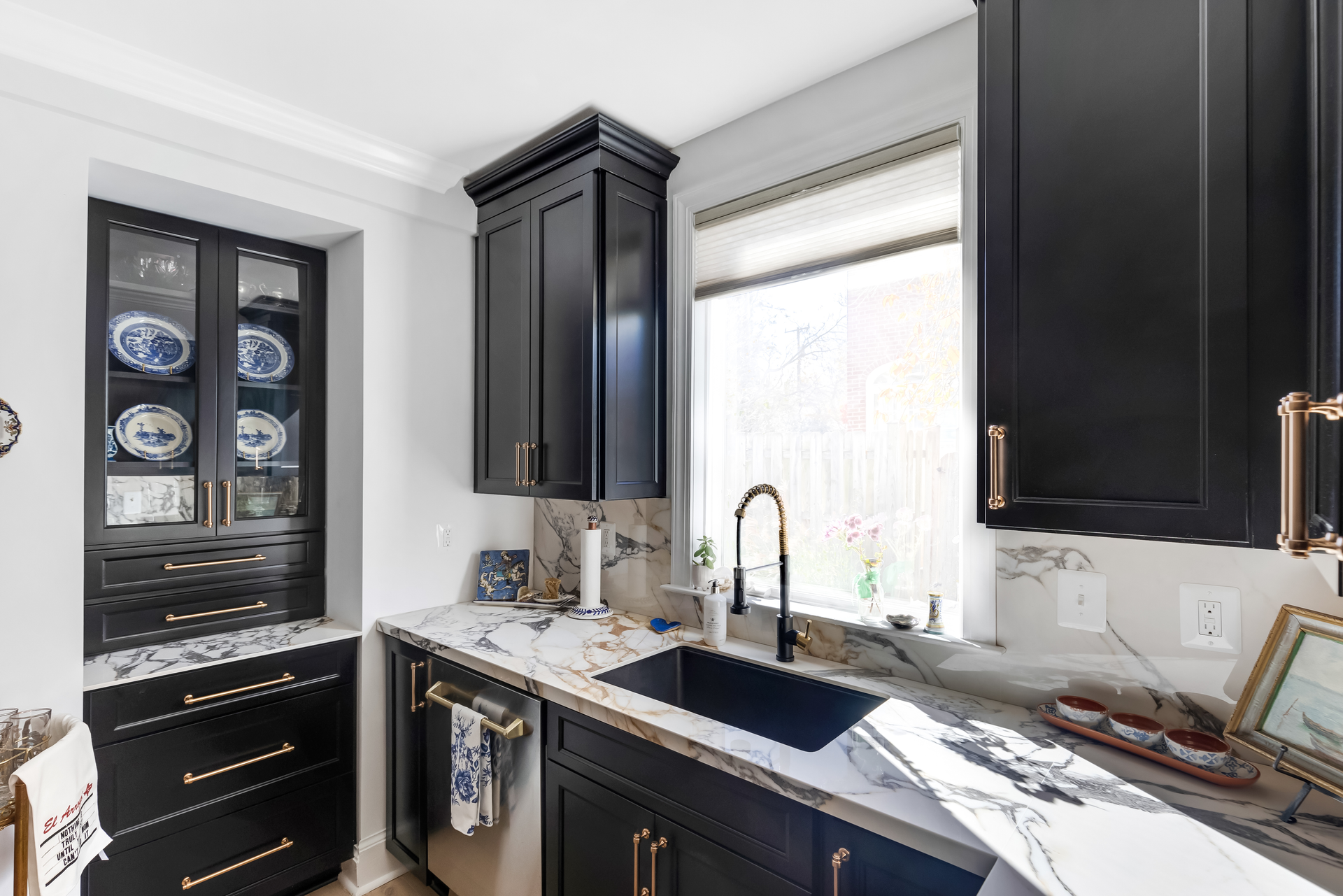 Waypoint Painted Black Cabinets with Calacatta Paonazzo Large Format Porcelain Countertops