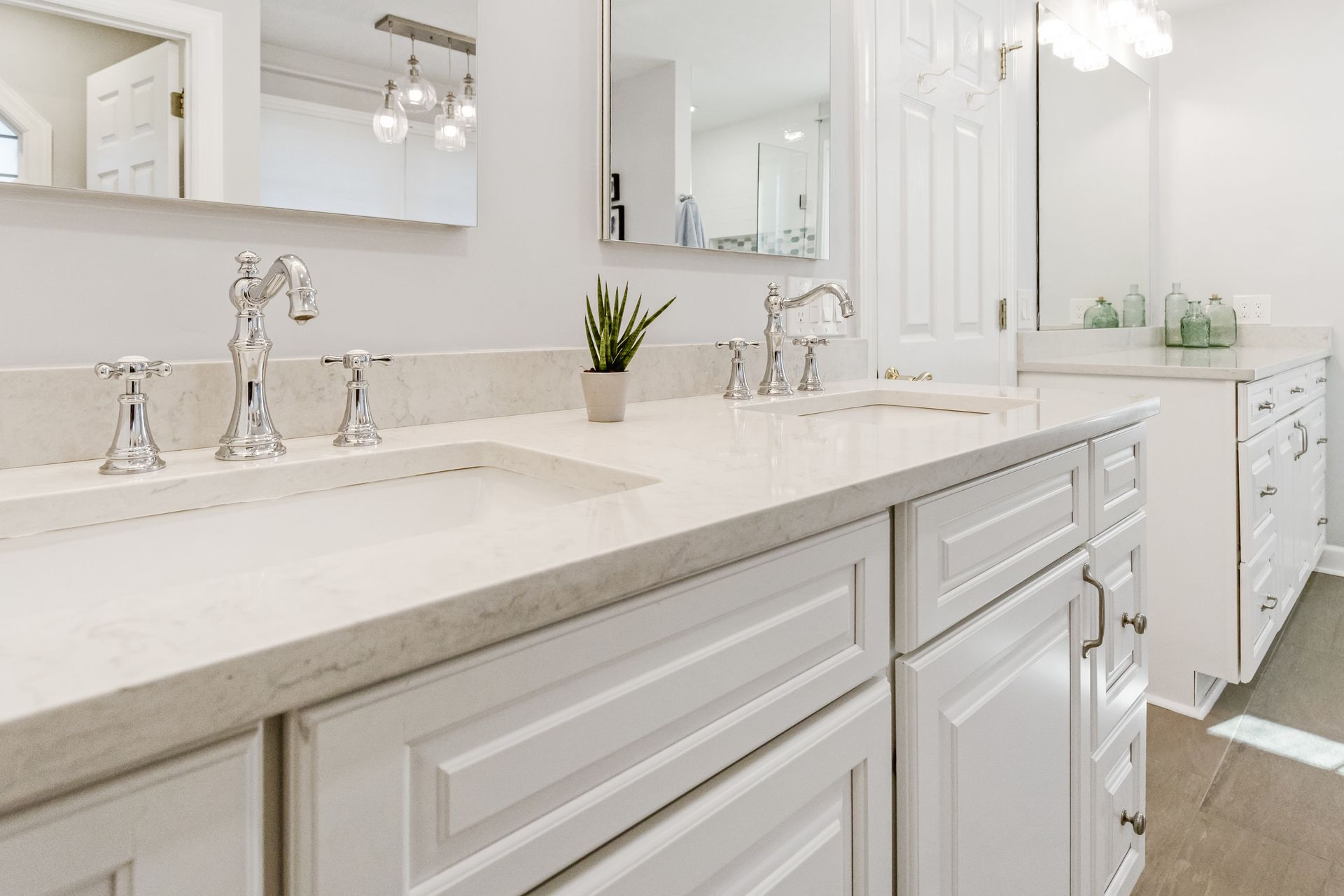 Mara Blanca Q Quartz Countertops and Waypoint Painted Linen Cabinets