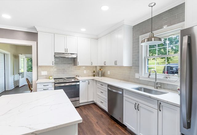 Waypoint Painted Linen Cabinets with Calacatta Laza Q Quartz Countertops and Dove Grey Tiles