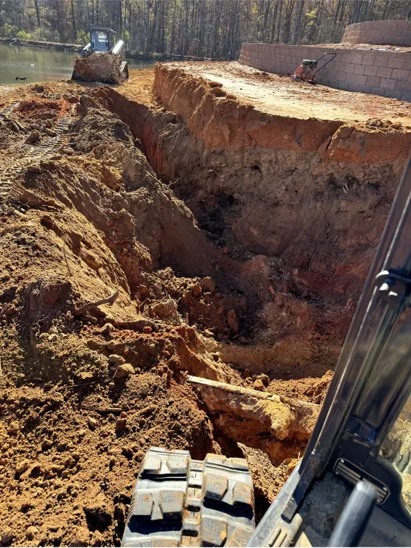 A bulldozer is digging a hole in the ground