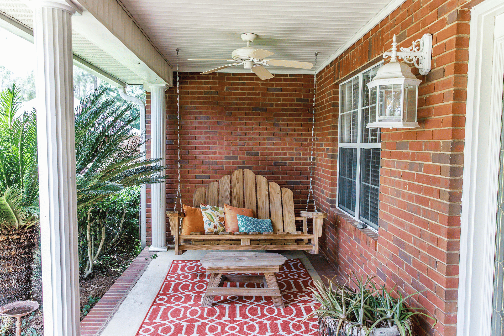 classy porch with personal touch photo - duval deck experts