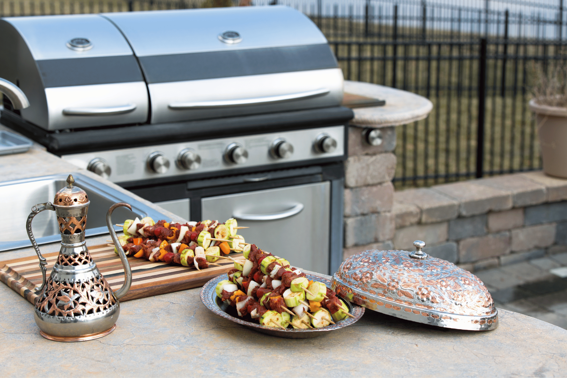 Unlock the Advantages: Why Your Backyard Needs a Custom Outdoor Kitchen photo