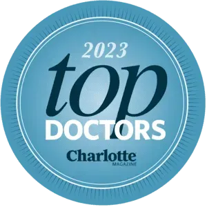 A blue top doctors logo from charlotte magazine
