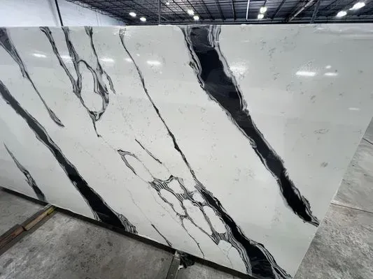 White countertop slab with bold black veining patterns.