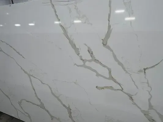 White quartz slab with grey veining.