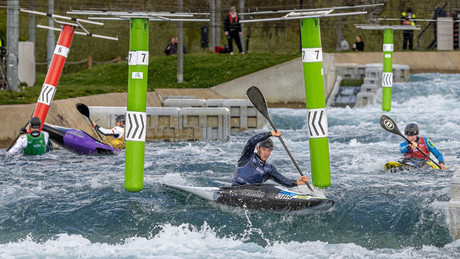 Athletes competing at kayak cross