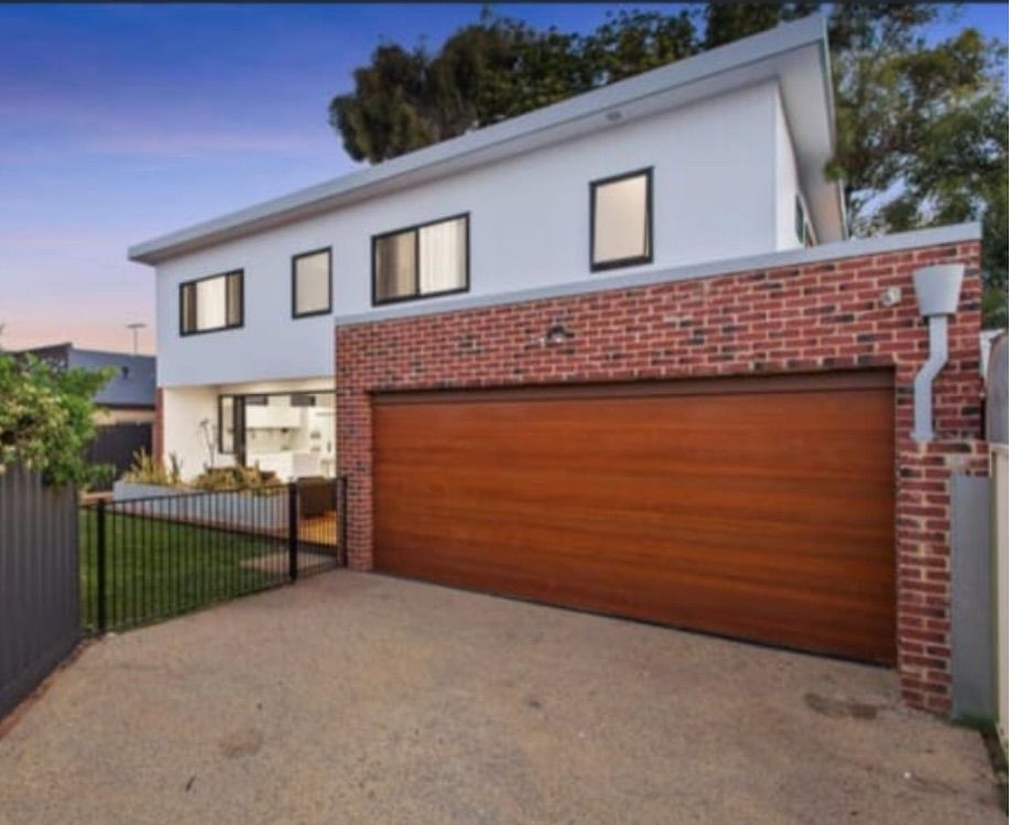 A House is Being Remodeled With Scaffolding and a Ladder — Premier Building QLD In Speewah, QLD