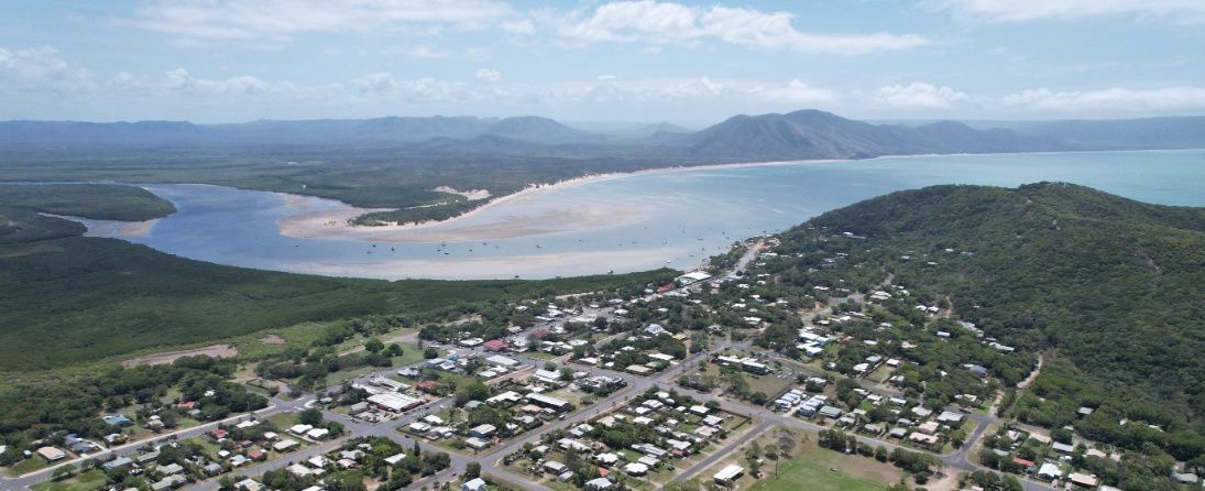 An Aerial View of a Small Town Surrounded by Mountains — Premier Inspections FNQ In Cooktown, QLD