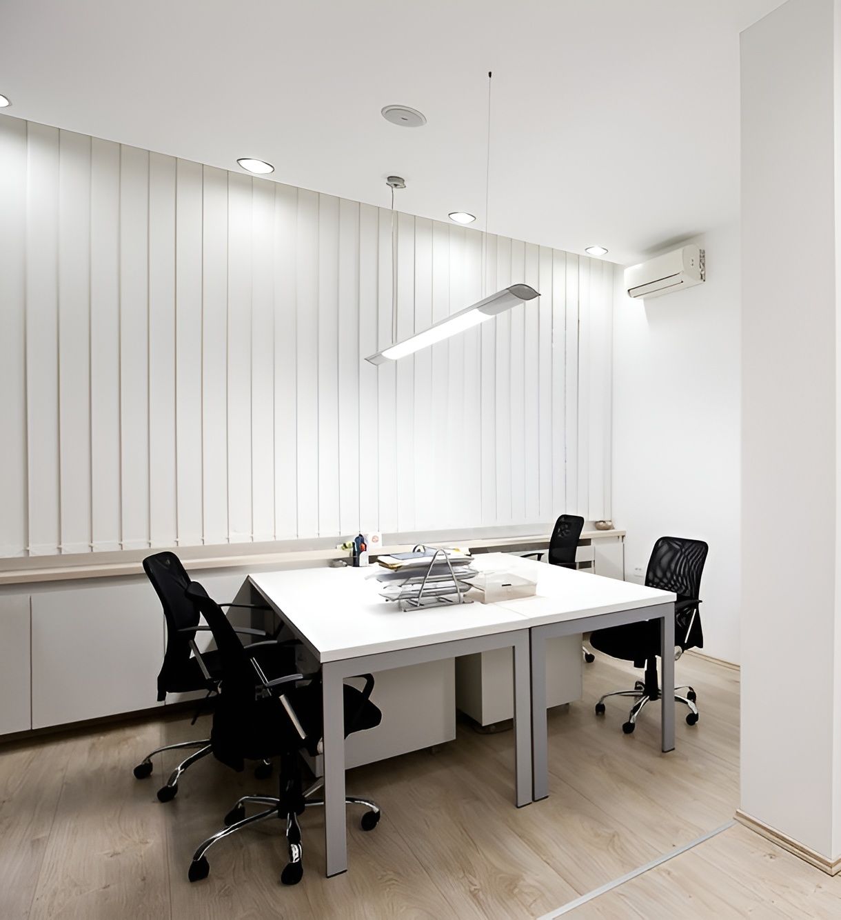 A Conference Room With White Tables and Black Chairs — Premier Building QLD In Speewah, QLD