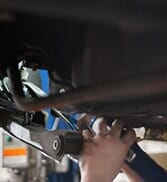 Man Working Under Car—Car Engine Repair in Salisbury, MA