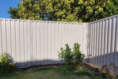 Picture of a Colorbond fence installed by JNS Fencing in Hobart TAS, showcasing its durability and sleek design